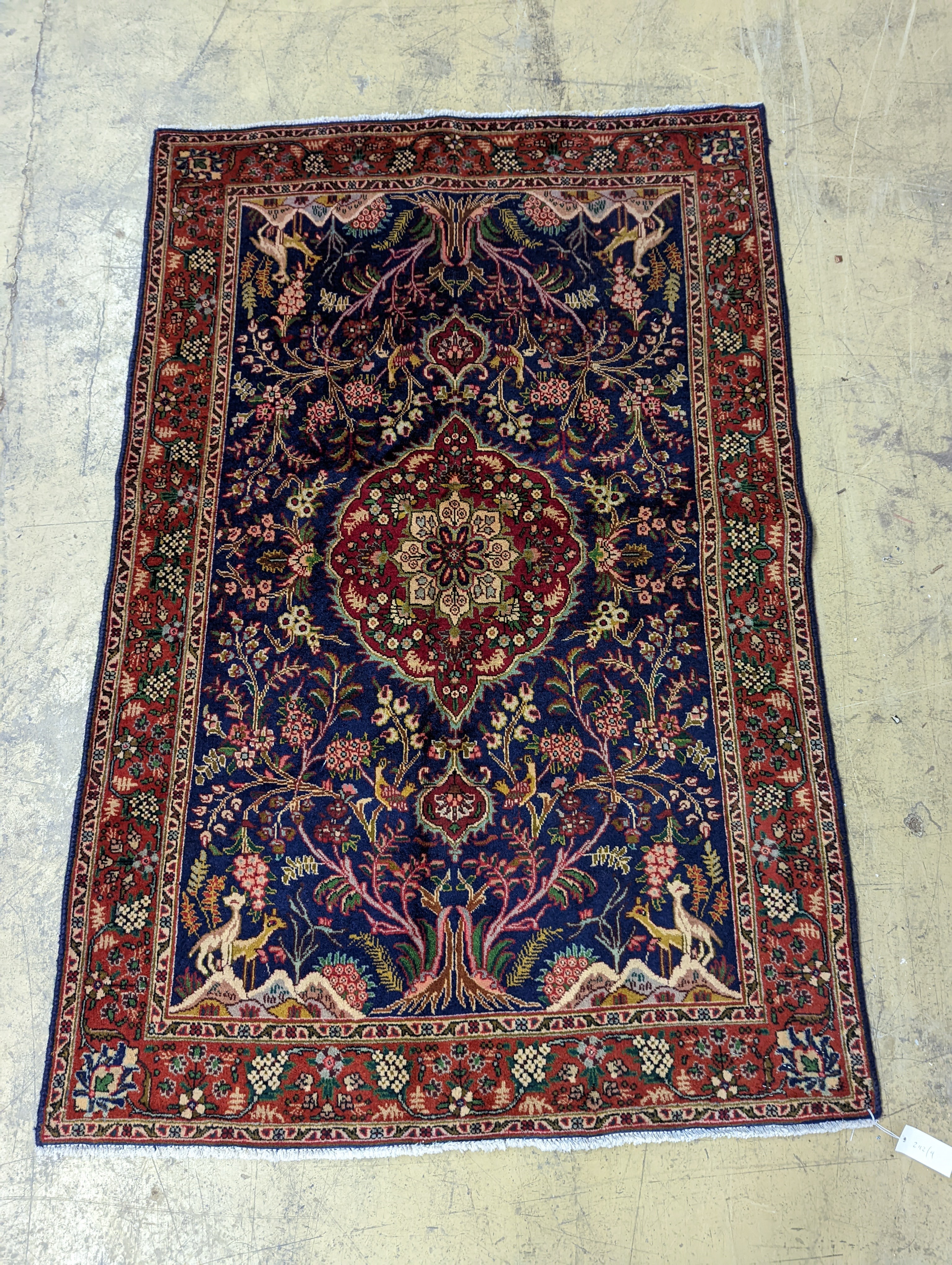 A Qom rug, 148 x 97cm